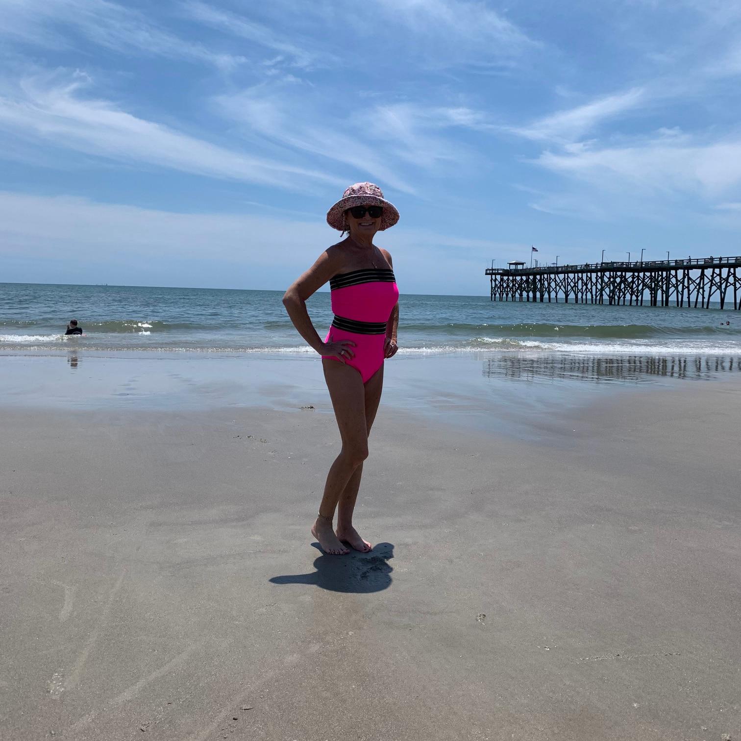 women yoga in beach